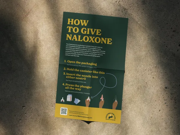 Image of a poster with a dark background and the text, how to give Naloxone