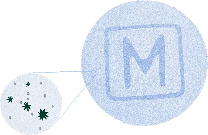 Illustration of M pill with microscope zoom.